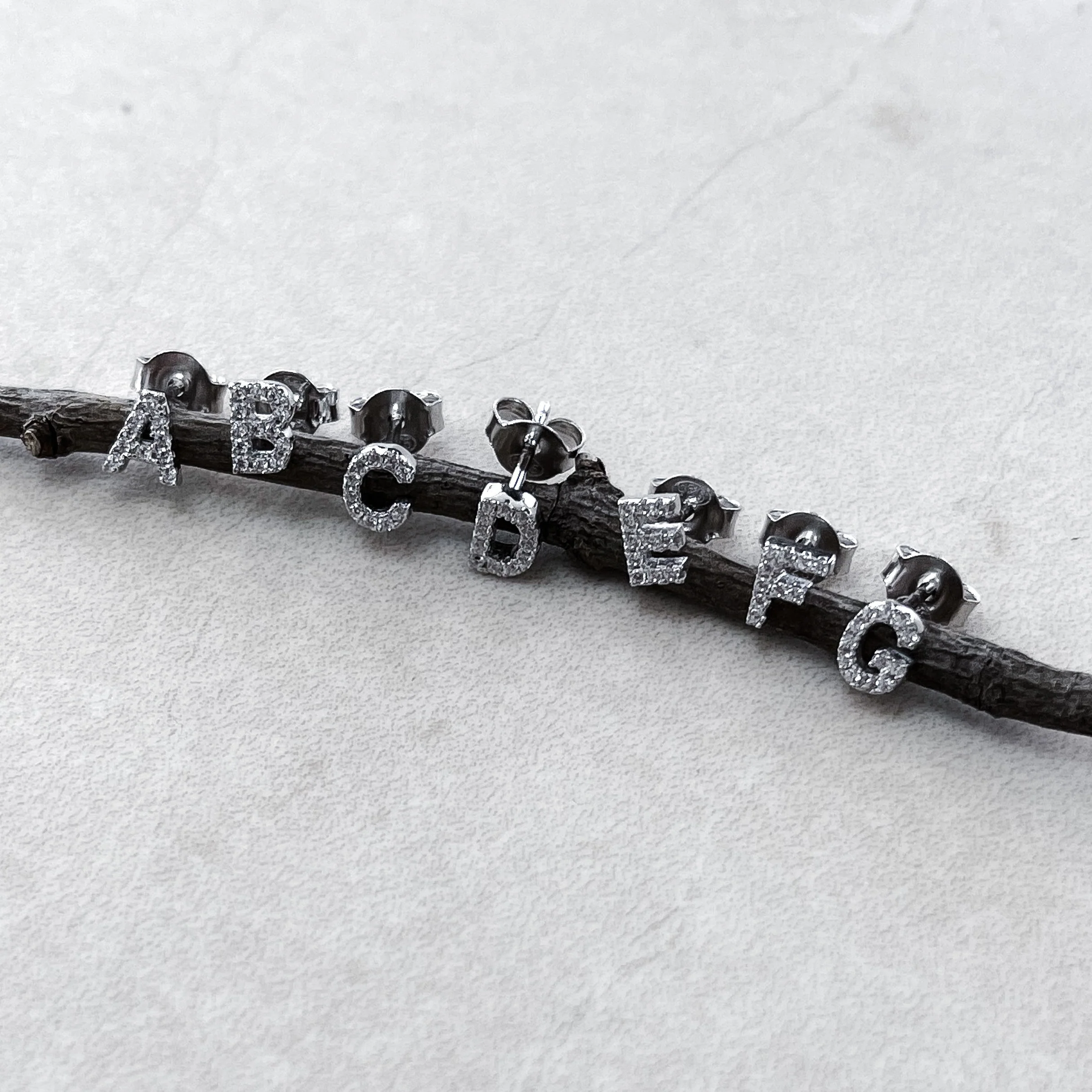 BOUCLE "LETRA ZIRCON" ARGENT