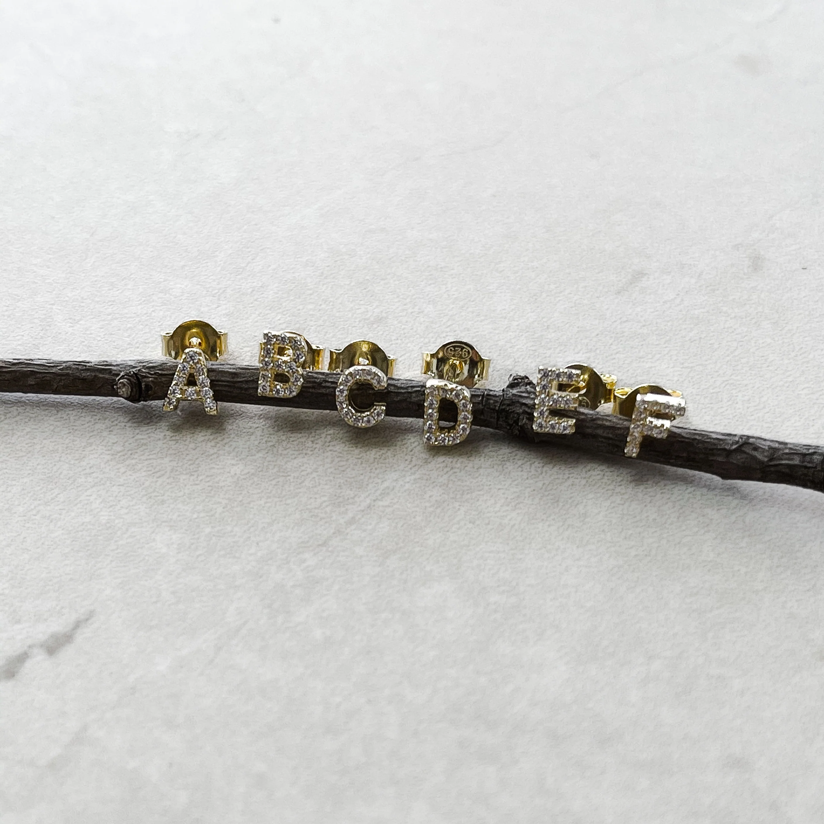 BOUCLE "LETRA ZIRCON OR"